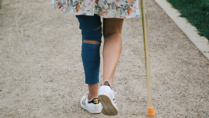 blanca walking with a neural sleeve and an adaptive clothing dress